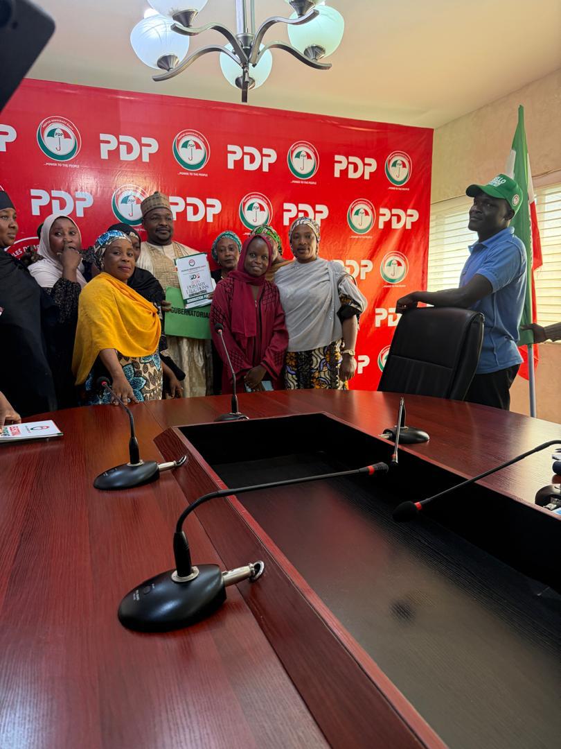 Amb. Muhammad Bello Dalha with party members at a One Kano campaign event