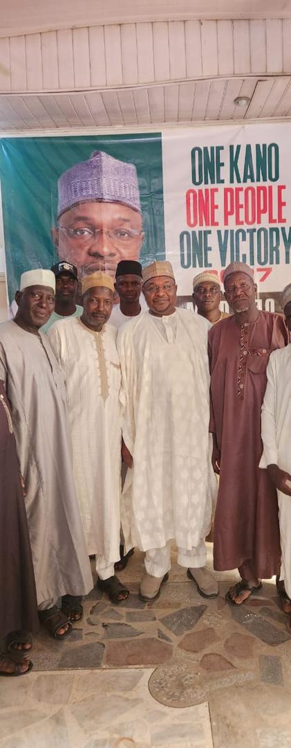 Muhamad Bello with women party supporters